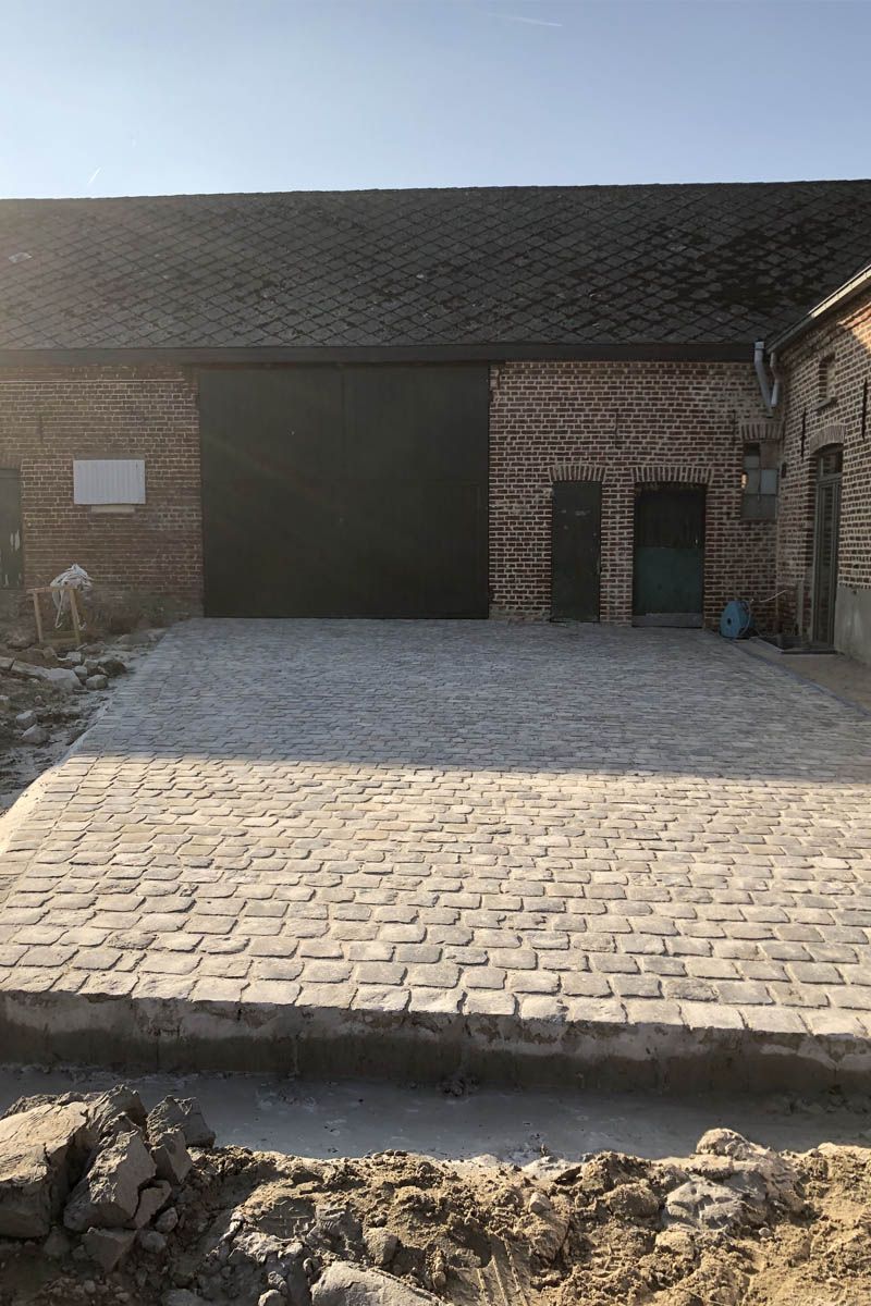 Heraanleg oprit in kasseien